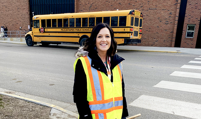 Andria Hart is one of three Pelican school staff who have mobilized a “High School Patrol” to improve safety during the highly traveled Highway 59 detour past the school’s back door.